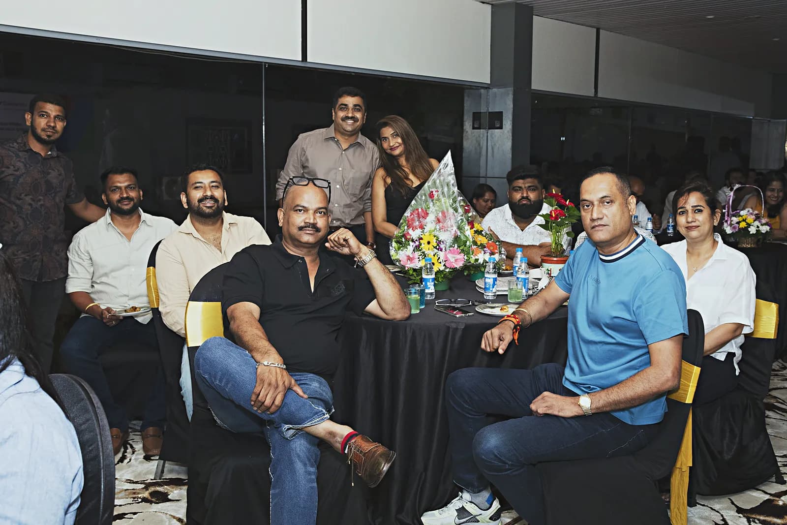 Business guests around a table at a HiBizz networking evening in Goa